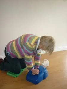 Doing CPR on a manikin