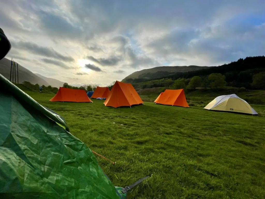 Scout or guide tents in a glen 