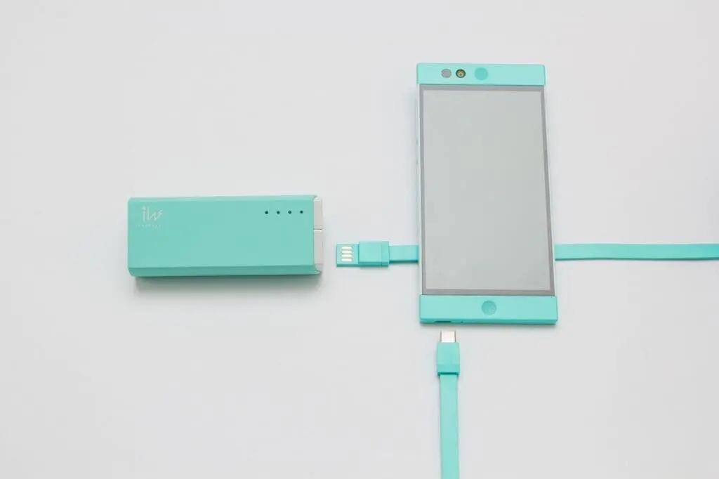 A mobile phone and a portable power bank charger