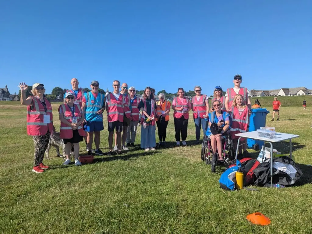 Parkrun volunteer group from Nairn Links