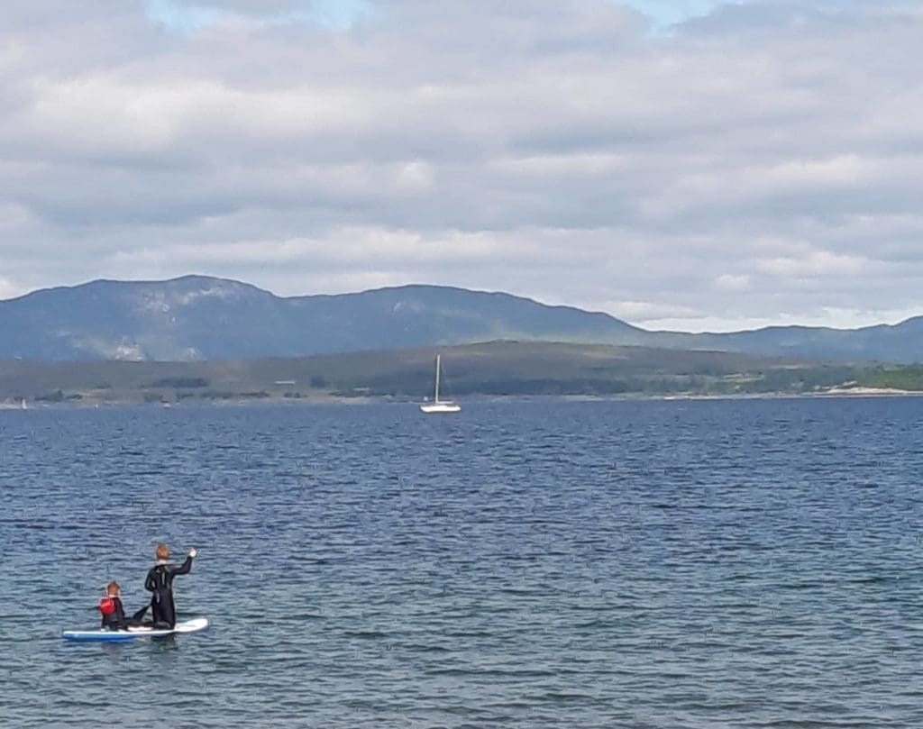 Paddle boarders on the sea