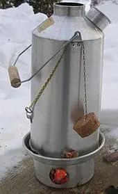 A Kelly kettle in the snow, outdoors